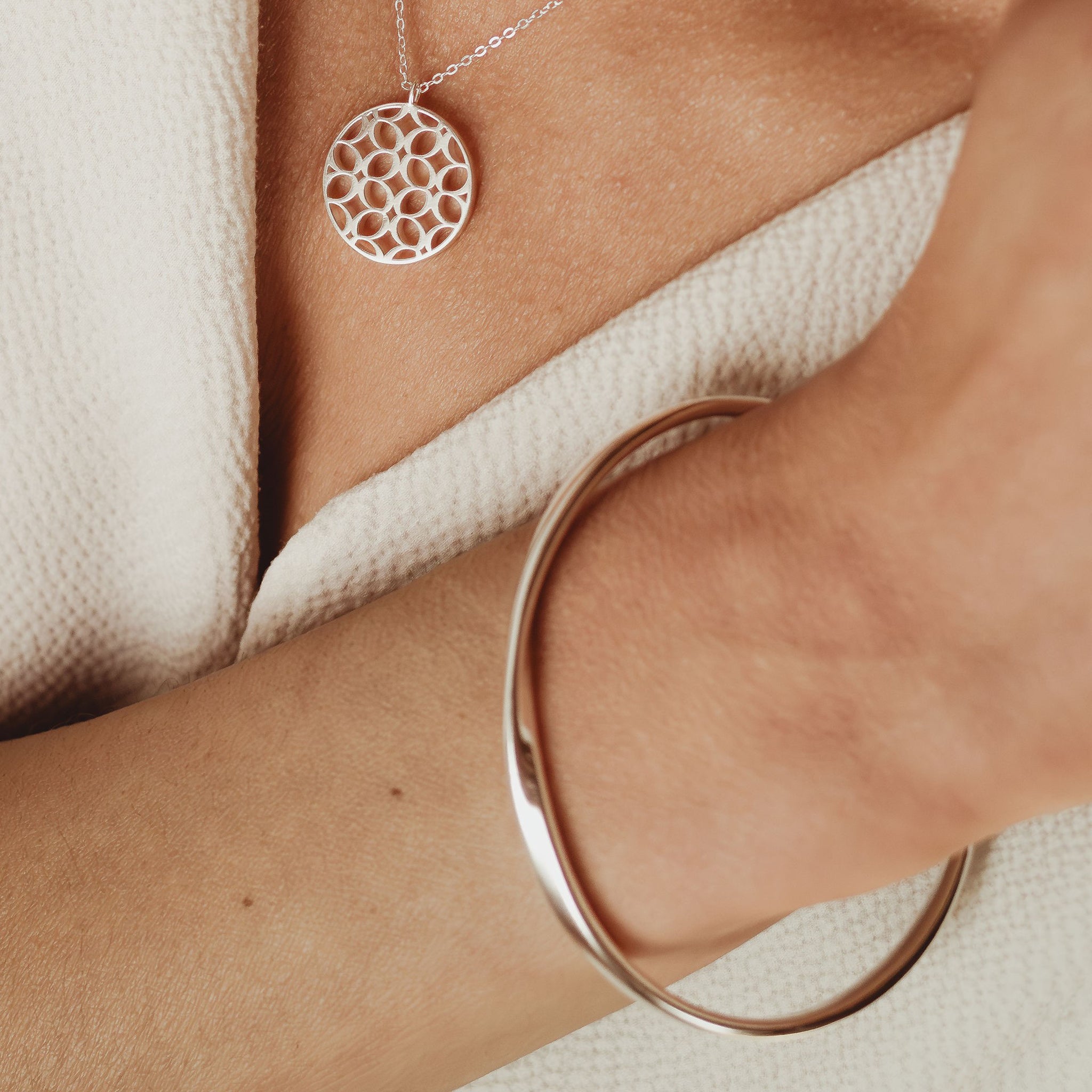 Twist Oval Bangle in Silver Considered Jewellery La Maison Couture