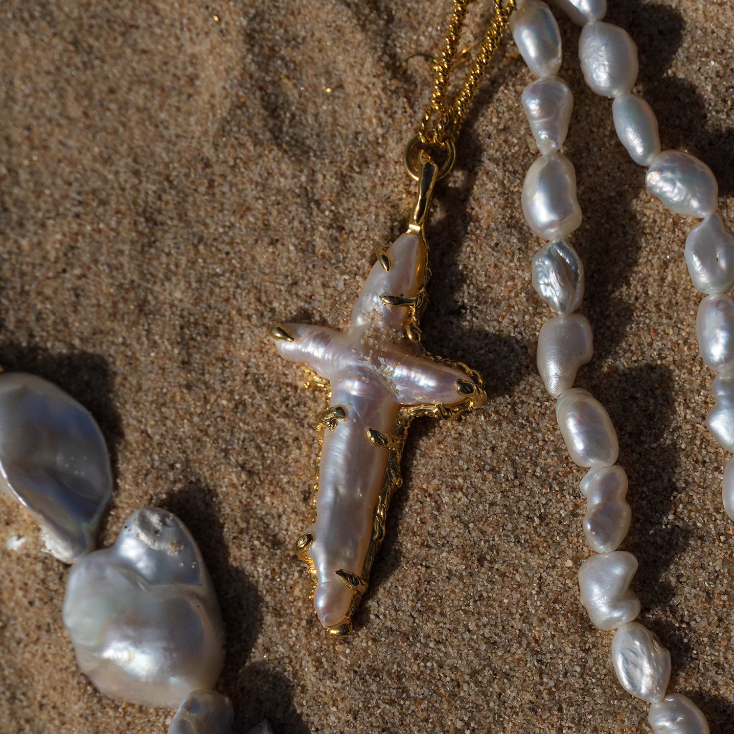 The Tethys Baroque Pearl Cross with Roman Chain Ece London Sustainable Jewellery La Maison Couture